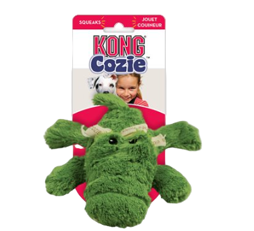 Green crocodile-shaped KONG Cozie toy with packaging on a white background