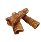 Three brown dog chew toys on a white background