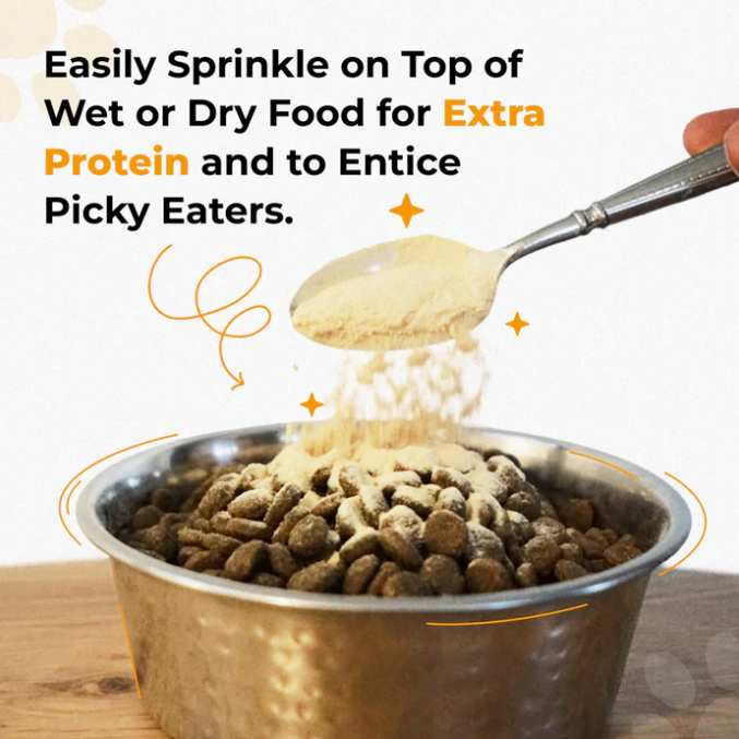 Dog food bowl with a spoonful of powder being sprinkled on top, with text about protein and enticement.
