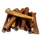Stack of brown dog chew sticks on a white background
