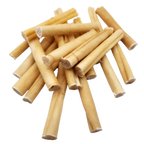 Stack of wooden chew sticks on a white background