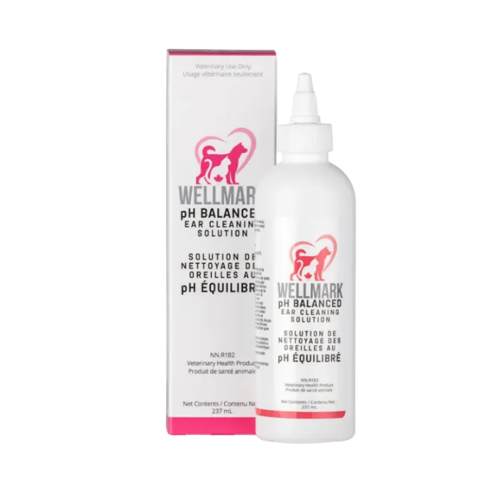 Wellmar pH Balance Ear Cleaning Solution shown as a white bottle with a white cap next to its white and pink retail box, featuring a pink dog silhouette logo.