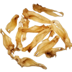 Dried shark fin pieces on a white background