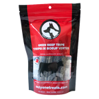 Package of green beef tripe treats for dogs with a red label and black border.