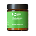 An amber glass jar of North Hound Life Whole Health Canadian Bovine Colostrum with a black lid and a green label, shown on a plain white background.