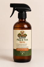 Waggy Butts Flea & Tick Spray bottle on a beige background